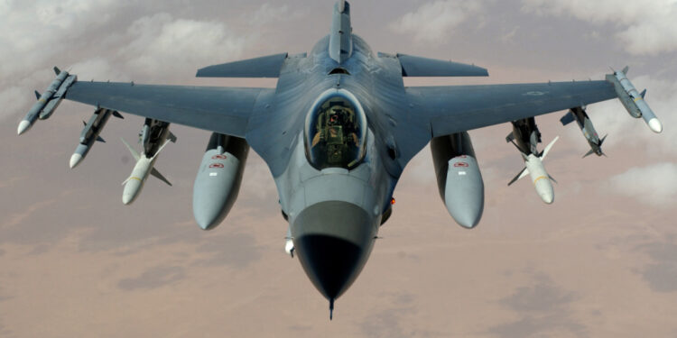 OPERATION IRAQI FREEDOM -- An F-16 Fighting Falcon flies a mission in the skies near Iraq on March 22.  The F-16s are from the 35th Fighter Wing "Wild Weasels", Misawa Air Base, Japan.  (U.S. Air Force photo by Staff Sgt. Cherie A. Thurlby)